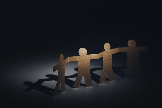unity of paper human team in the dark
