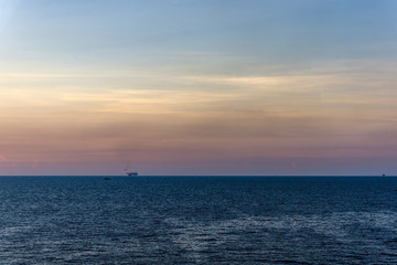 Landscape or seascape of an oil field