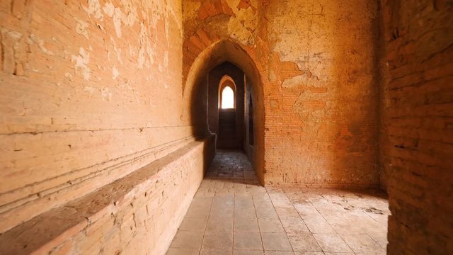 FPV: Walking in Old Temple. Travel Adventure Lifestyle Vacation Concept. 4K Steadycam POV Slowmotion Footage. Bagan, Myanmar.