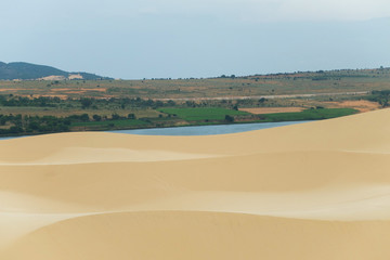 White sand dune in Mui Ne, Vietnam Phan Thiet, Vietnam. Popular tourist attraction