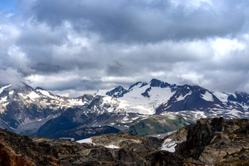 Colorful rocks and snow covered peaks of Whistler, BC, Canada