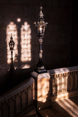 Interior of church with silhouette of lamp post