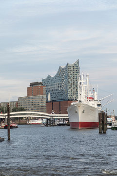 view to harbor of Hamburg with historic Cap San Diego  and famous Elb Philharmony