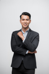 Happy Asian boss manager business man wears black suit in relax pose.