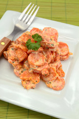 carrot with fresh cream on a plate