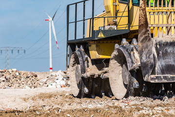 compactor at landfill