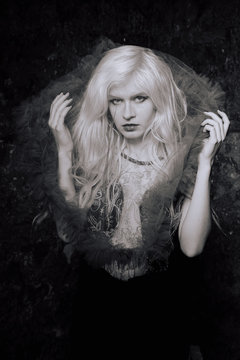 portrait of a young girl in a veil, black and white photo