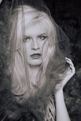portrait of a young girl in a veil, black and white photo