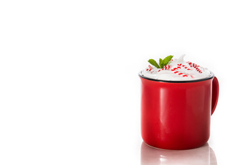 Peppermint coffee mocha decorated with candy canes for Christmas isolated on white background. Copy...
