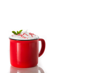 Peppermint coffee mocha decorated with candy canes for Christmas isolated on white background. Copy space