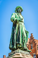Fototapeta na wymiar The Statue of Jan Van Eyck in Bruges, Belgium