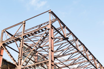 A fragment of the rusty structure of the old factory
