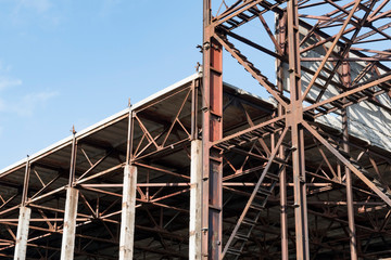 A fragment of the rusty structure of the old factory