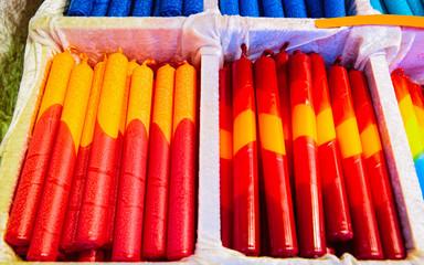 Colorful Handmade Candles in Christmas market in Germany in Europe winter. German Night street Xmas...