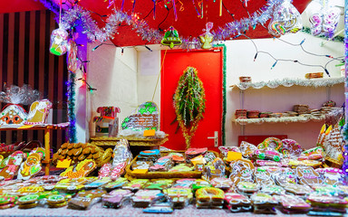 One of the most traditional sweet treats which are gingerbreads pictured at Christmas Market in Riga, Latvia. German street Xmas and holiday fair. Advent Decoration and Stalls on Bazaar