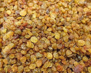 Raisins are beautifully decomposed, yellow is the highest grade. Delicious background or wallpaper.