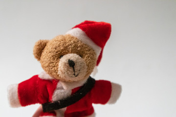 Close Up of teddy beard dressed as Santa Claus in Christmas