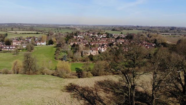 English Historic Village And Countryside In Winter Aerial Landscape Zooming Out