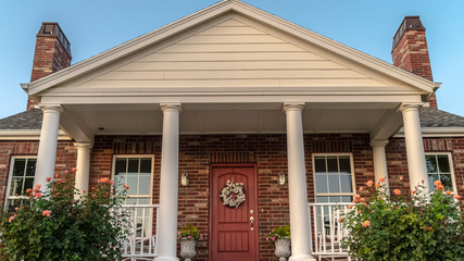 Panorama frame Front facade of a modern house with pillars