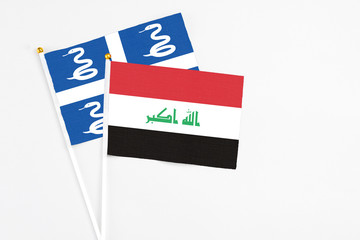 Iraq and Martinique stick flags on white background. High quality fabric, miniature national flag....