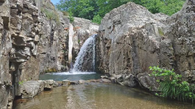 Amazing Cehennem waterfall falling, hitting surface
