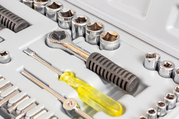 Fototapeta premium Socket wrench in toolbox. New opened tool kit. Mechanic instruments. Auto repair concept