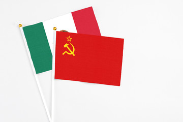 Soviet Union and Mexico stick flags on white background. High quality fabric, miniature national flag. Peaceful global concept.White floor for copy space.