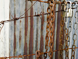 hOld rusty  chain and Rust wires with Zinc rust  background