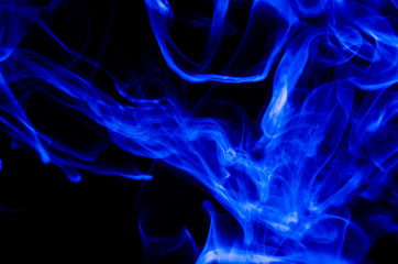 Fototapeta premium Nature Abstract: The Delicate Beauty and Elegance of a Wisp of Blue Smoke