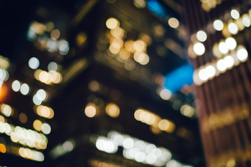 Blurred background of evening skyscrapers exterior for young advertising about business or real...