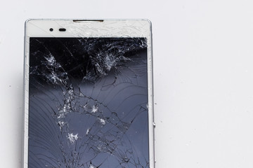 broken phone with cracked screen