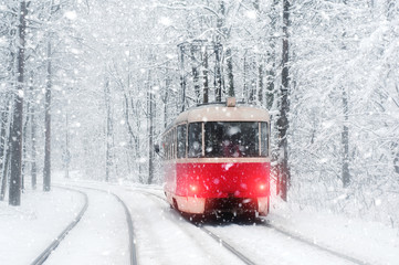 retro tram in snowy forest. amazing winter background.