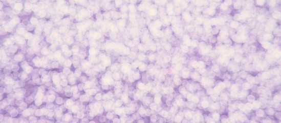 Abstract festive background .Christmas and New Year holidays glitter bokeh, glitter, bluer. Pink color.Long banner
