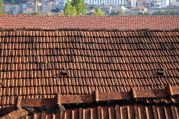 Closeup on red tiled roofs of Europe.