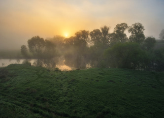 spring morning. foggy dawn. picturesque foggy river