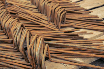 Reinforcement blanks for concrete work on a construction site.