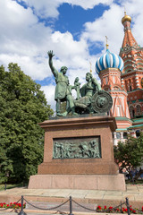 Fototapeta na wymiar Monument to Minin and Pozharsky next the Cathedral of Vasily Blessed on a summer day in Moscow