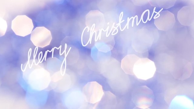 "Merry Christmas" Text agaist Glowing Bokeh Backround