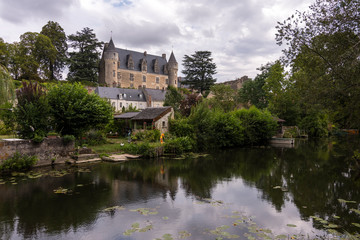 Fototapeta na wymiar The beautiful village of Montresor bathed by the Indrois river, located in the Loire Valley.