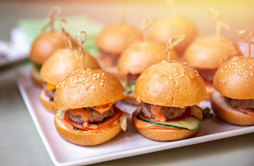 Restaurant food mini burger table with snack delicious dining. Catering service