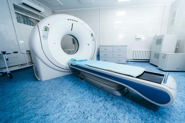 Modern room with multi detector spiral CT Scanner ( Computed Tomography). Medical technology...