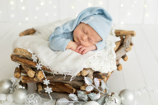first photo shoot. newborn child. Christmas card with baby