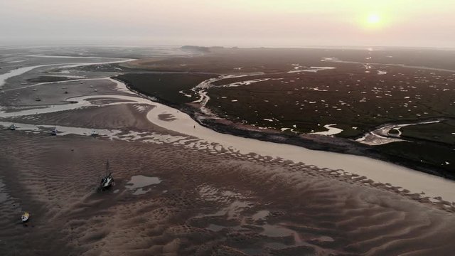 Estuary And Harbour At Low Tide, East Coast, UK, Panning Shot, Wells-Next-The-Sea, England Aerial Landscape
