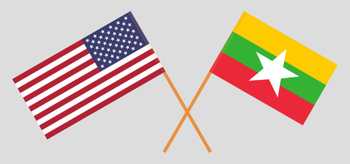 Crossed flags of Myanmar and the USA