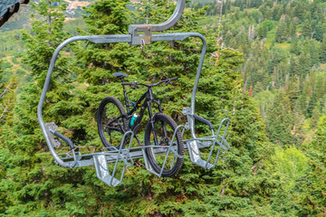 Lift accessed mountain biking with bikes on chairlifts in Park City in summer