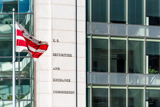 Washington DC, USA - October 12, 2018: US United States Securities and Exchange Commission SEC architecture modern building sign, logo, flag, glass windows
