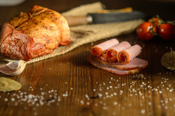fresh ham on a wooden table