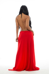 Latin woman in red dress from behind