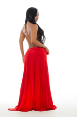 Latin woman in red dress from behind