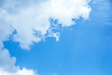 Fototapeta na wymiar bottom view of blue sky with white clouds and sunshine